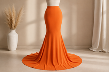 Sewn garment with lain hem